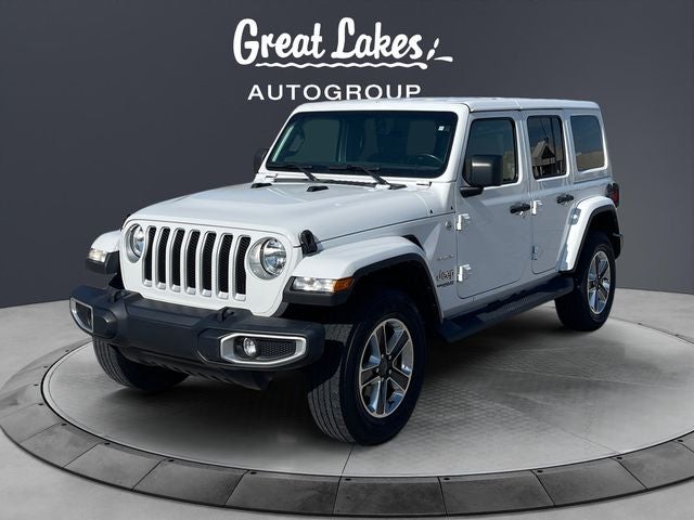 2022 Jeep Wrangler Unlimited Sahara in Bright White Clearcoat — front three-quarter view
