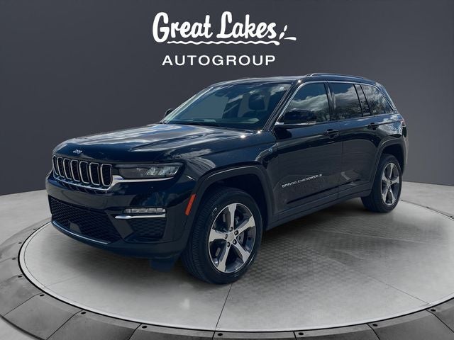 2024 Jeep Grand Cherokee 4xe in Diamond Black Crystal Pearlcoat — front three-quarter view