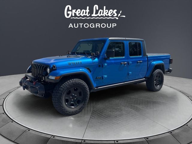 2021 Jeep Gladiator Willys in Hydro Blue Pearlcoat — front three-quarter view