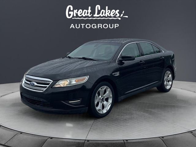 2011 Ford Taurus SEL in Ebony Black — front three-quarter view
