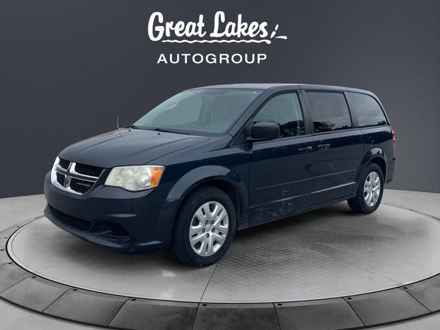 2014 Dodge Grand Caravan SE in Maximum Steel Metallic Clearcoat — front three-quarter view