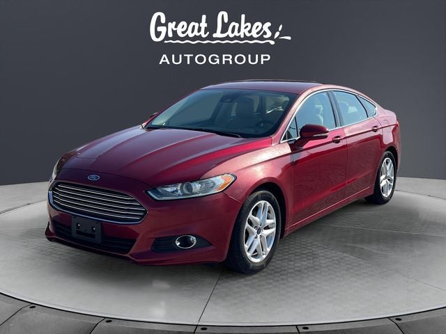 2014 Ford Fusion SE in Ruby Red Tinted Clearcoat — front three-quarter view