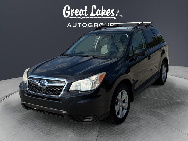 2014 Subaru Forester 2.5i Premium in Dark Gray Metallic — front three-quarter view