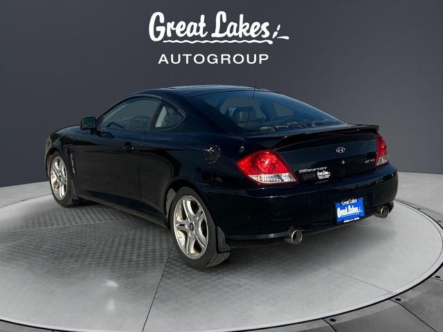 2005 Hyundai Tiburon — rear three-quarter view
