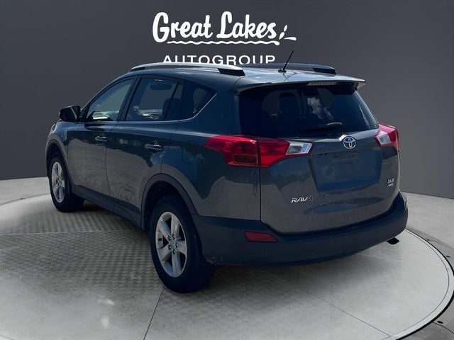 2013 Toyota RAV4 — rear three-quarter view